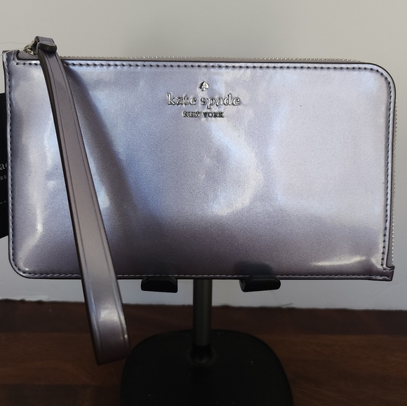 kate spade Handbags - Kate Spade Shimmering Silver Wristlet